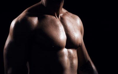Fit,And,Sporty,Bodybuilder,Over,Black,Background.,Sportsman,In,Studio.